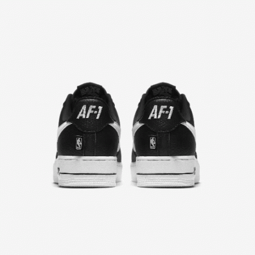 A Pair Of Red And White Nike Air Force 1 Shoes GIF