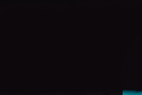 A Pair Of Red White And Black Nike Basketball Shoes GIF