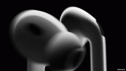 A Pair Of White Earbuds On A Black Background With The Words Thinkfiles Below GIF