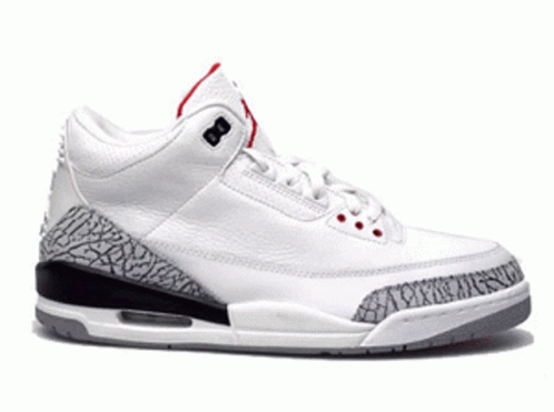 A Pair Of Yellow And Black Nike Air Jordan Shoes GIF