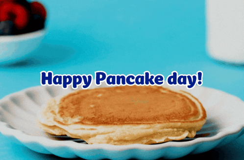 A Pancake On A White Plate With The Words Happy Pancake Day GIF
