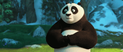 A Panda Bear Is Standing In A Field With His Arms Crossed And Looking At The Camera . GIF