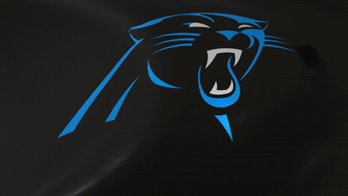 A Panther With Its Mouth Open Is On A Dark Background GIF