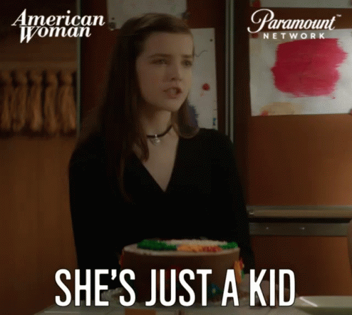 A Paramount Network Ad For American Woman Shows A Girl Standing Next To A Cake GIF