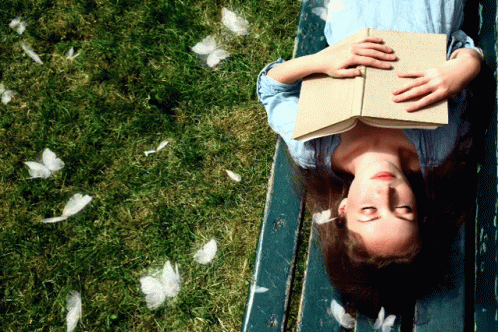 A Peaceful Day With A Book And Butterflies GIF