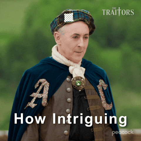 A Peacock Ad For The Traitors Shows A Man In A Cape GIF