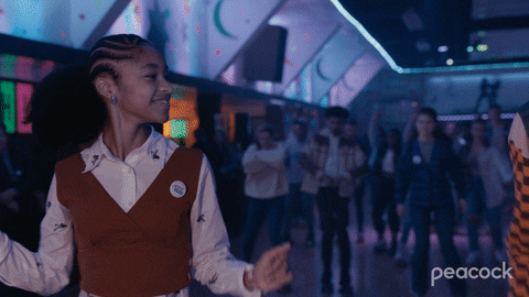 A Peacock Ad Shows A Girl Dancing In A Club GIF
