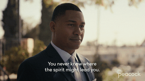 A Peacock Ad With A Man In A Suit And Tie GIF