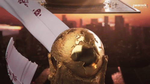 A Peacock Logo Can Be Seen Behind A Globe GIF