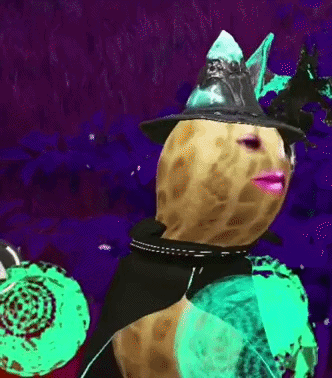 A Peanut Is Wearing A Witch Hat And A Black Cape GIF