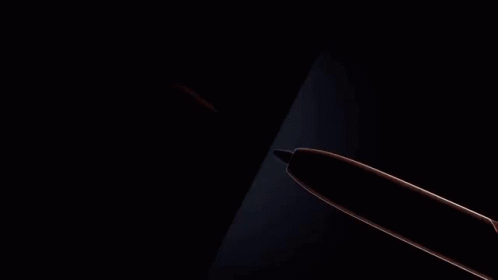 A Pen Is Being Used To Write On A Cell Phone Screen GIF
