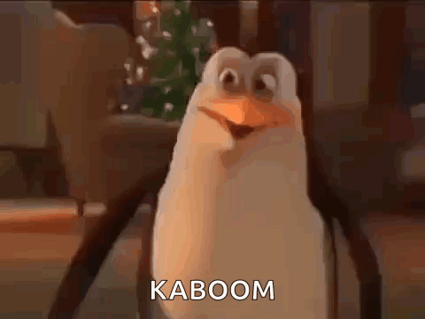 A Penguin From Spongebob Squarepants Is Standing In Front Of A Christmas Tree And Says Kaboom . GIF