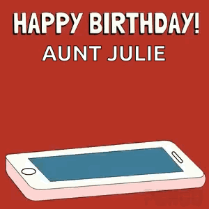 A Penguin Is Holding A Birthday Cake In Front Of A Cell Phone .. GIF