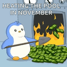 A Penguin Is Holding A Shovel In Front Of A Pool Of Money . GIF