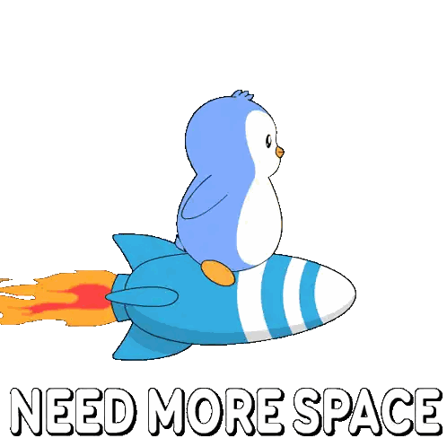 a penguin is sitting on top of a blue rocket with the words need more space below it