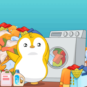A Penguin Is Standing In Front Of A Washing Machine With Clothes In It GIF