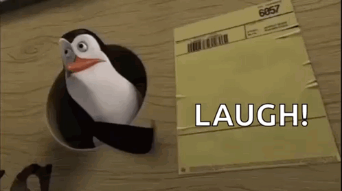 Penguin Laughing Out Of Hole In Paper GIF