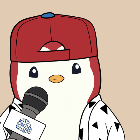 A Penguin Is Wearing A Red Hat And Holding A Microphone With A Globe On It GIF
