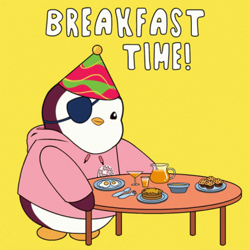 A Penguin Wearing A Party Hat Is Sitting At A Table With Food And The Words Breakfast Time GIF