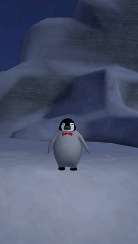 A Penguin Wearing A Red Bow Tie Is Standing In A Snowy Area GIF