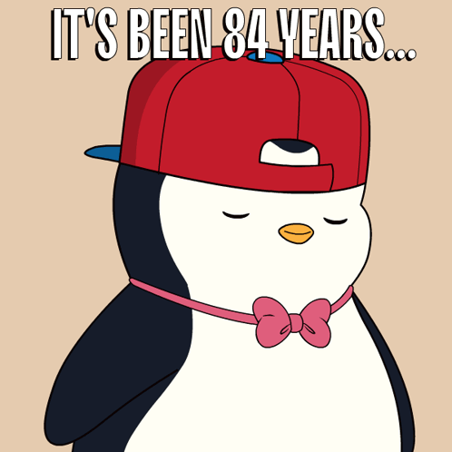 A Penguin Wearing A Red Hat And A Pink Bow Tie Has Been 84 Years GIF