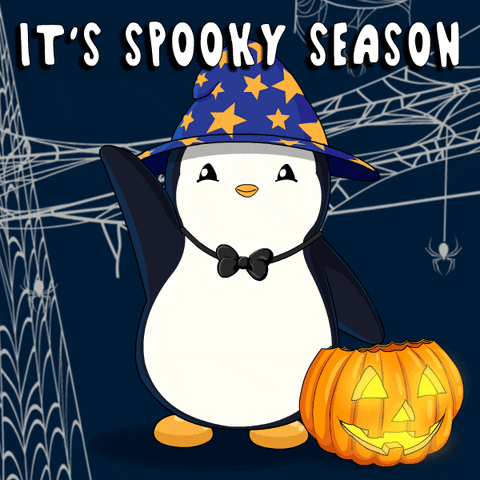 A Penguin Wearing A Witch Hat And Bow Tie Holds A Pumpkin With The Words It 'S Spooky Season Above It GIF
