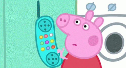 A Peppa Pig Cartoon Character Holding A Blue Toy Phone GIF