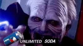A Pepsi Can Is Being Held Up In Front Of A Man GIF