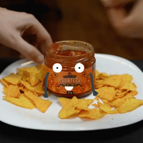 A Person Dipping Tortilla Chips Into A Jar Of Frontiera Sauce GIF