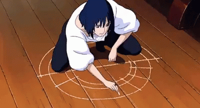 A Person Drawing A Circle On The Floor With Chalk GIF