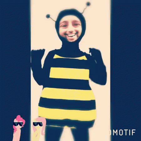 A Person Dressed In A Bee Costume With Motif Written On The Bottom Right GIF