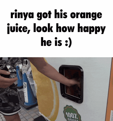A Person Getting An Orange Juice From A Machine That Says 100 % On It GIF