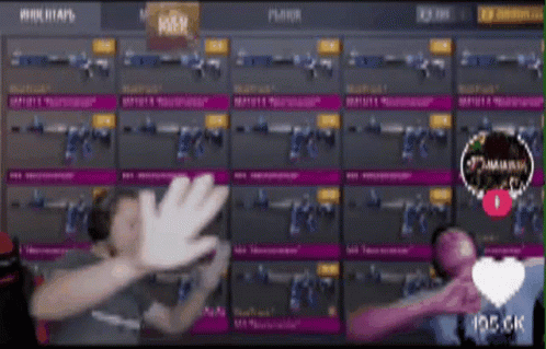A Person Giving A High Five In Front Of A Display Of Weapons GIF