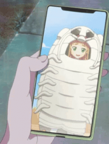 A Person Holding A Cell Phone With A Picture Of A Girl In A Lobster Costume GIF