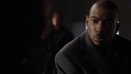 A Person Holding A Device That Says Polygraph On The Screen GIF