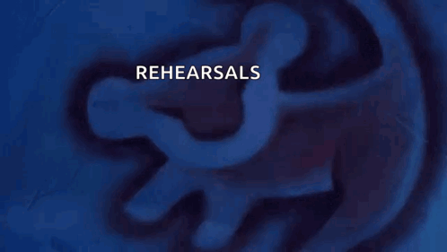A Person Holding A Gun With Rehearsals Written On It GIF