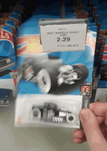 A Person Holding A Hot Wheels Basic Car For 2.29 GIF
