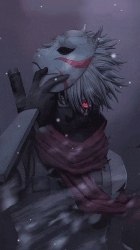 A Person Holding A Mask With A Red Eye GIF