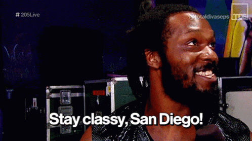 A Person Holding A Microphone With The Words Assy San Diego Behind Them GIF
