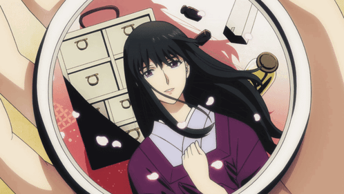 A Person Holding A Picture Of A Woman With The Letter P On The Drawers GIF