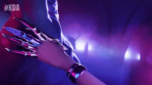 A Person Holding Another Person 'S Hand With #Kda On The Bottom Right GIF