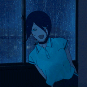 A Person In A Blue Shirt Is Standing In Front Of A Window At Night GIF