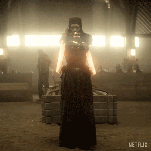 A Person In A Dark Room With A Netflix Logo On The Bottom Right GIF