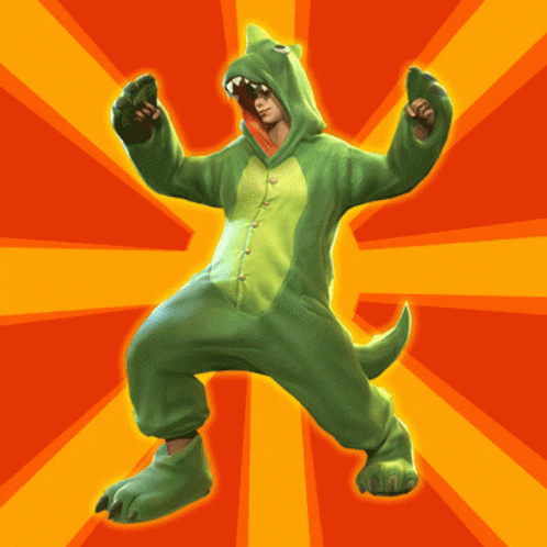 A Person In A Green Dinosaur Costume Is Standing In Front Of A Yellow And Orange Background GIF