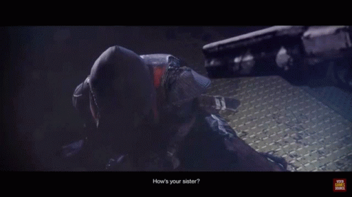 A Person In A Hooded Jacket With Glowing Eyes And The Words " Your Video Source " At The Bottom GIF