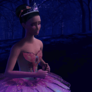 a person in a purple flower costume is crawling on the ground