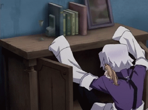 A Person In A Purple Shirt Is Crawling Out Of A Drawer GIF