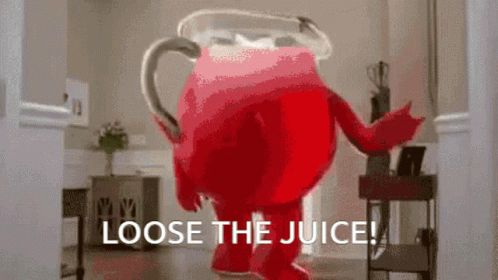 A Person In A Red Costume Is Standing In A Room With The Words `` Loose The Juice '' . GIF