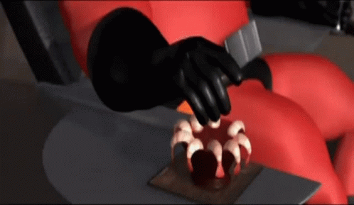 A Person In A Red Suit Is Sitting In A Chair And Eating Something GIF