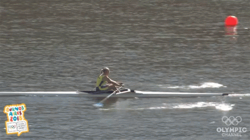 A Person In A Rowing Boat With The Olympic Channel Logo On The Bottom GIF